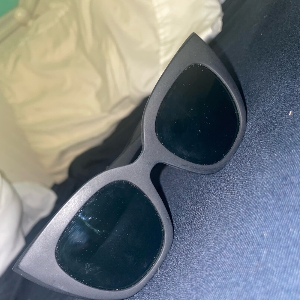 Tom’s sunglasses. Worn 5 times.